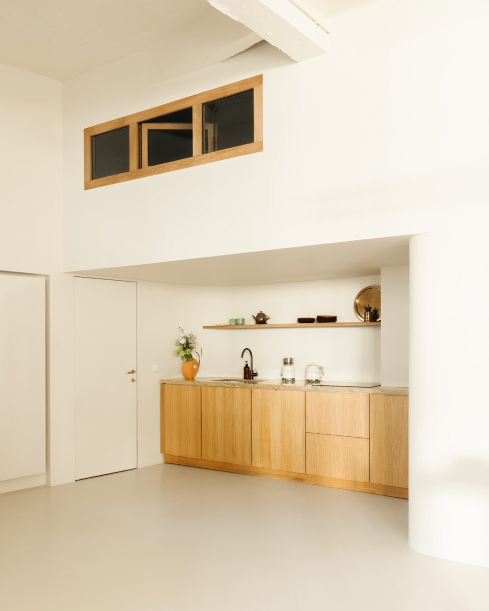 A kitchen with a white refrigerator freezer sitting inside of it